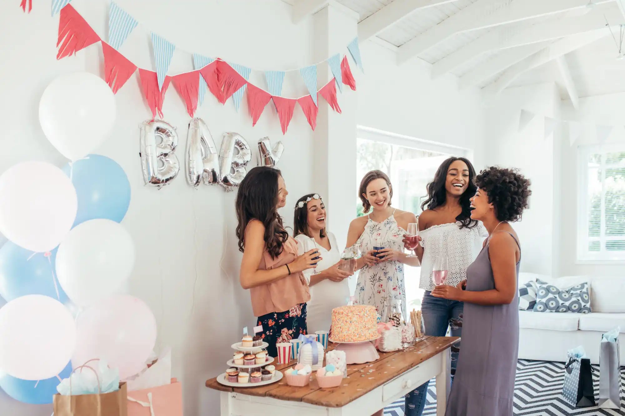 A group of women celebrating a baby shower.