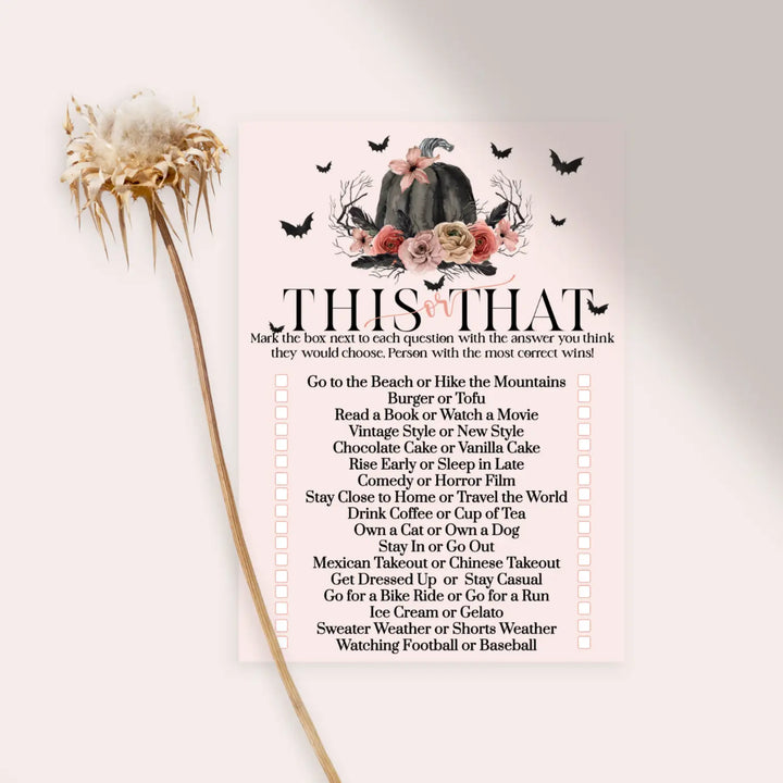 Spooky chic gothic bridal shower game - would she rather - pink & black pumpkin design - 25 guests - party games
