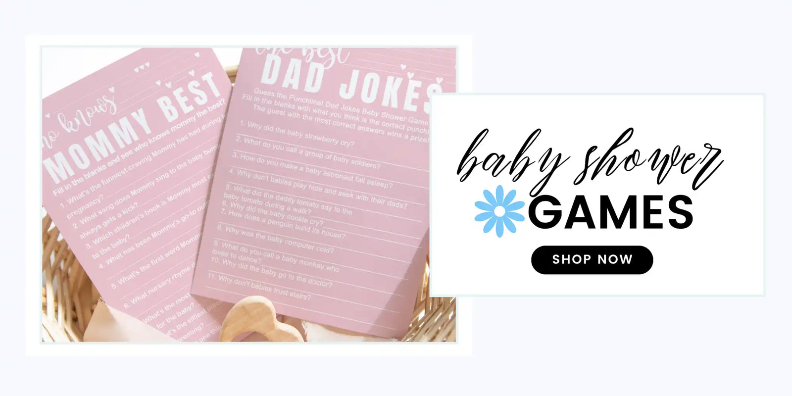 Pink baby shower game cards in a basket.