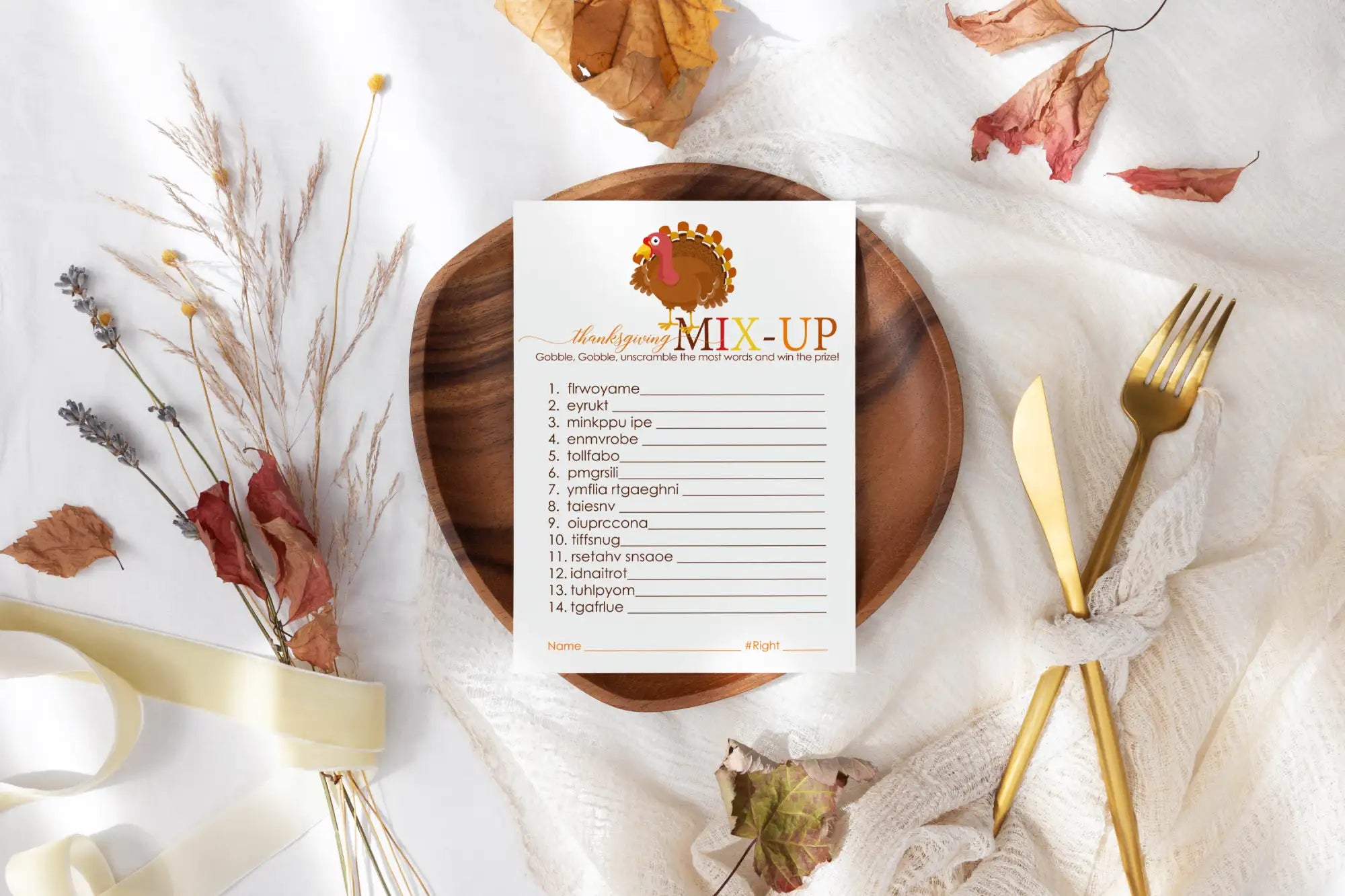 White paper ’mix-up’ game card with gold turkey design and list of words on it.